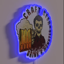 Charger l&#39;image dans la galerie, Neon beer bar decoration with colorful glowing &#39;monster&#39; design.