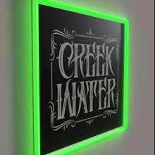 Charger l&#39;image dans la galerie, Glowing creek water whiskey logo in vibrant RGB neon colors