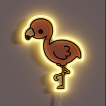 Charger l&#39;image dans la galerie, Cute cartoon-style flamingo standing on one leg with a glowing yellow neon outline.
