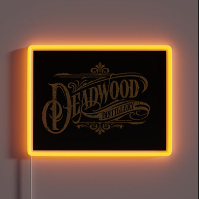RGB illuminated Deadwood Distillery logo in vintage neon style