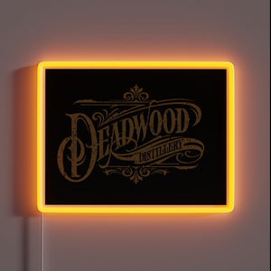 RGB illuminated Deadwood Distillery logo in vintage neon style