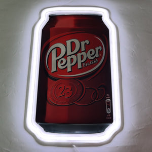 Dr Pepper can neon sign glowing dynamically, with its bold red and white lights creating a fun, retro-inspired ambiance