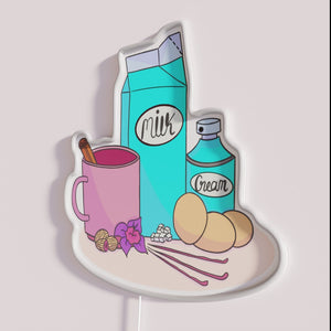Neon barware decoration featuring colorful egg nog ingredients signage artwork