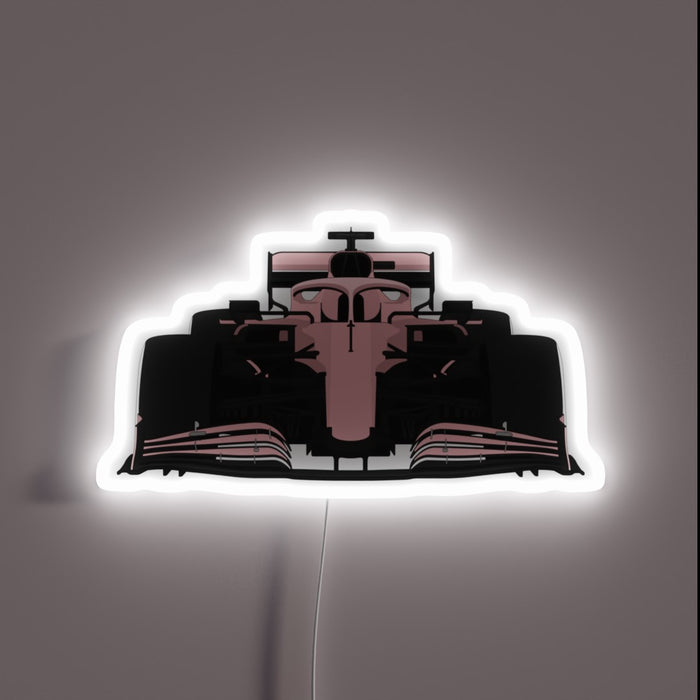 Vibrant Pink Neon Sign Featuring an F1 Car Silhouette Design