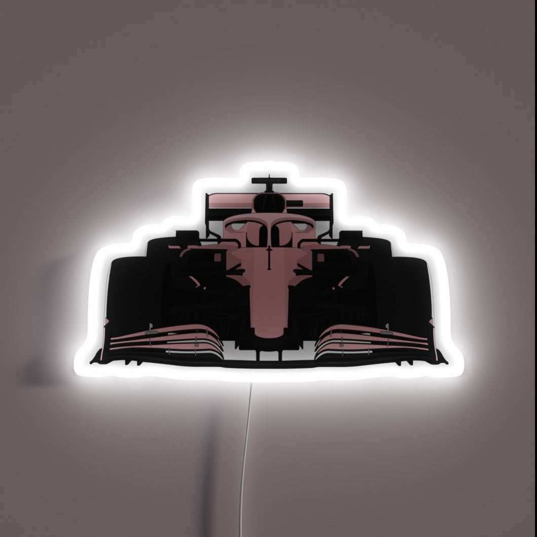 Vibrant Pink Neon Sign Featuring an F1 Car Silhouette Design