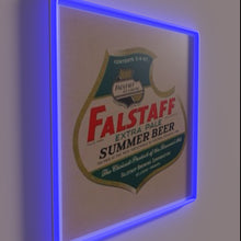 Charger l&#39;image dans la galerie, Eye-catching neon bar decor featuring Falstaff&#39;s iconic summer beer logo