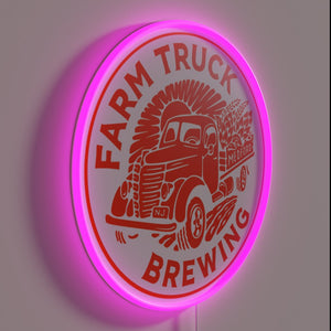 Neon sign featuring colorful RGB lights for farm truck brewery ambiance.