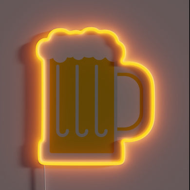 Glowing neon sign featuring a vibrant frothy beverage design.