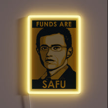 Charger l&#39;image dans la galerie, Alt text: “Neon sign featuring a stylized portrait of a man with glasses and the phrase ‘Funds Are SAFU’ glowing in yellow.”
