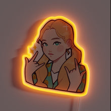 Charger l&#39;image dans la galerie, Alt text: &quot;Neon sign of a cartoon-style girl with long blonde hair making a double rock hand gesture, glowing with orange light.&quot;

