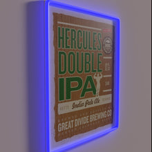 Charger l&#39;image dans la galerie, Eye-catching RGB neon sign featuring the Great Divide Hercules logo prominently.