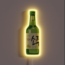 Charger l&#39;image dans la galerie, Neon illuminated sign featuring vibrant green and purple hues, glowing