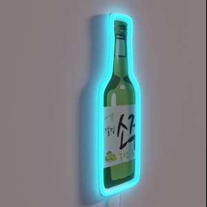 Vibrant neon green grape soju bar decor and ambiance accent.