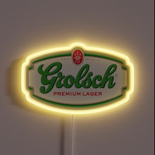 Charger l&#39;image dans la galerie, Grolsch Premium Lager neon sign with a classic green, red, and white label design surrounded by a soft yellow glow.
