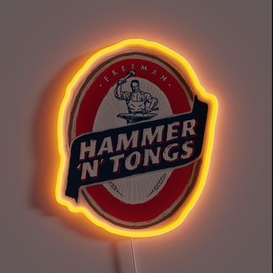 Eye-catching Hammer and Tongs POP Sign in Vibrant Neon Colors