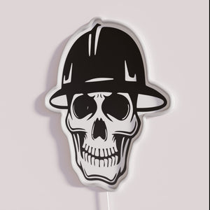 Neon Construction Warning Sign with Skull and Hard Hat Design