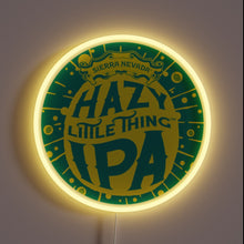 Charger l&#39;image dans la galerie, Customneon sign featuring the Hazy Little Thing IPA logo from Sierra Nevada Brewing, with vibrant yellow and green colors surrounded by a glowing yellow neon ring