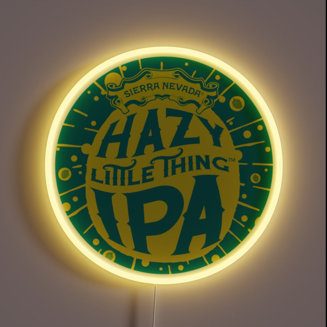Customneon sign featuring the Hazy Little Thing IPA logo from Sierra Nevada Brewing, with vibrant yellow and green colors surrounded by a glowing yellow neon ring
