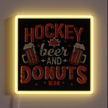 Charger l&#39;image dans la galerie, Vibrant neon lightbox featuring hockey-themed beer donut Canadian pride graphics