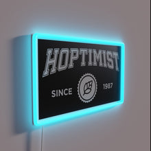 Charger l&#39;image dans la galerie, Vibrant RGB neon sign with HOPTIMIST logo in bold font