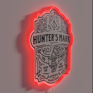 Radiant, eerie glow of whiskey and blood in dark hunter's realm