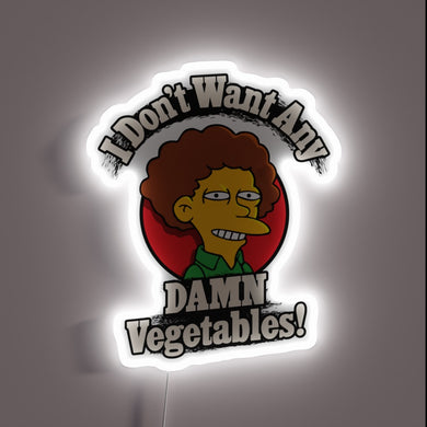 Neon sign protesting vegetable addition to meals with bold colors.