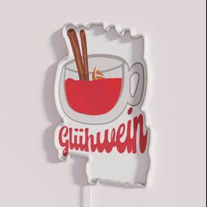 Neon bar decor saying mulled wine is Christmas holiday drink