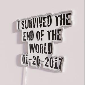 Post-apocalyptic humor neon decoration survived end of world sign.