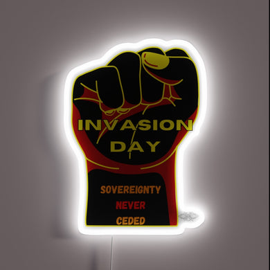 Indigenous rights protest symbol, Invasion Day sovereignty statement in bold letters.