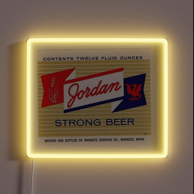 Neon sports-themed beer sign featuring Jordan Strong logo in RGB.