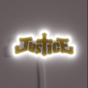 Justice logo neon sign in gold gothic style with cross-shaped 