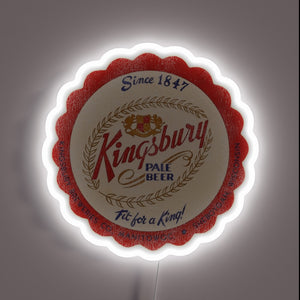 Retro beer advertisement from Wisconsin's Manitowoc area, vibrant color display.