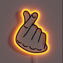 Charger l&#39;image dans la galerie, Neon sign of a hand making the Korean finger heart gesture with an orange glow.
