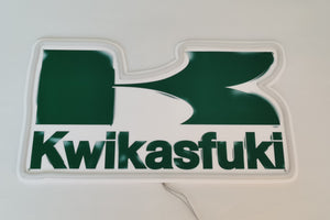 Kwifasfuki neon sign glowing brightly, featuring bold, vibrant letters that add a unique and quirky touch to any room or bar setup