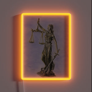 Symbol of truth and justice illuminated in vibrant RGB colors.