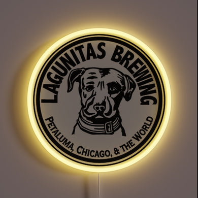 **Alt Text:** Lagunitas Brewing neon sign with dog logo and yellow glow.
