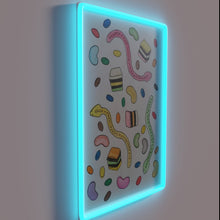 Charger l&#39;image dans la galerie, Vibrant RGB lighting illuminates a colorful lollies theme neon sign.