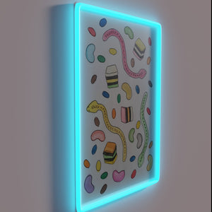 Vibrant RGB lighting illuminates a colorful lollies theme neon sign.