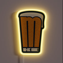 Charger l&#39;image dans la galerie, Colorful illuminated MP pint glass with vibrant RGB neon swirl.