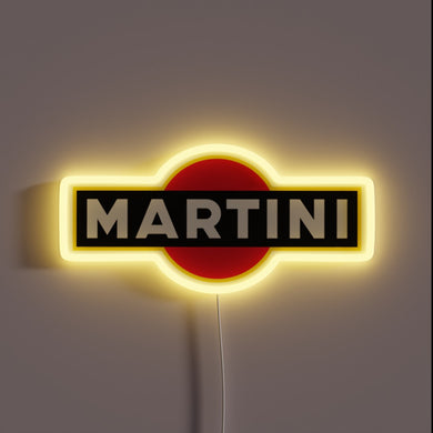 Neon sign of the MARTINI logo with bold white text on a black rectangle over a red circle, glowing with a yellow outline.
