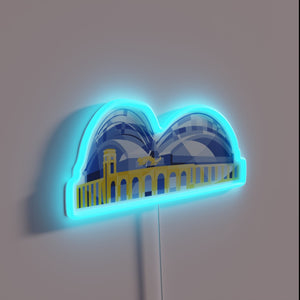 Vibrant neon illumination of Milwaukee's iconic baseball stadium architecture.