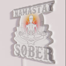 Charger l&#39;image dans la galerie, Vibrant neon sign with yoga skeleton in sobriety support humor.