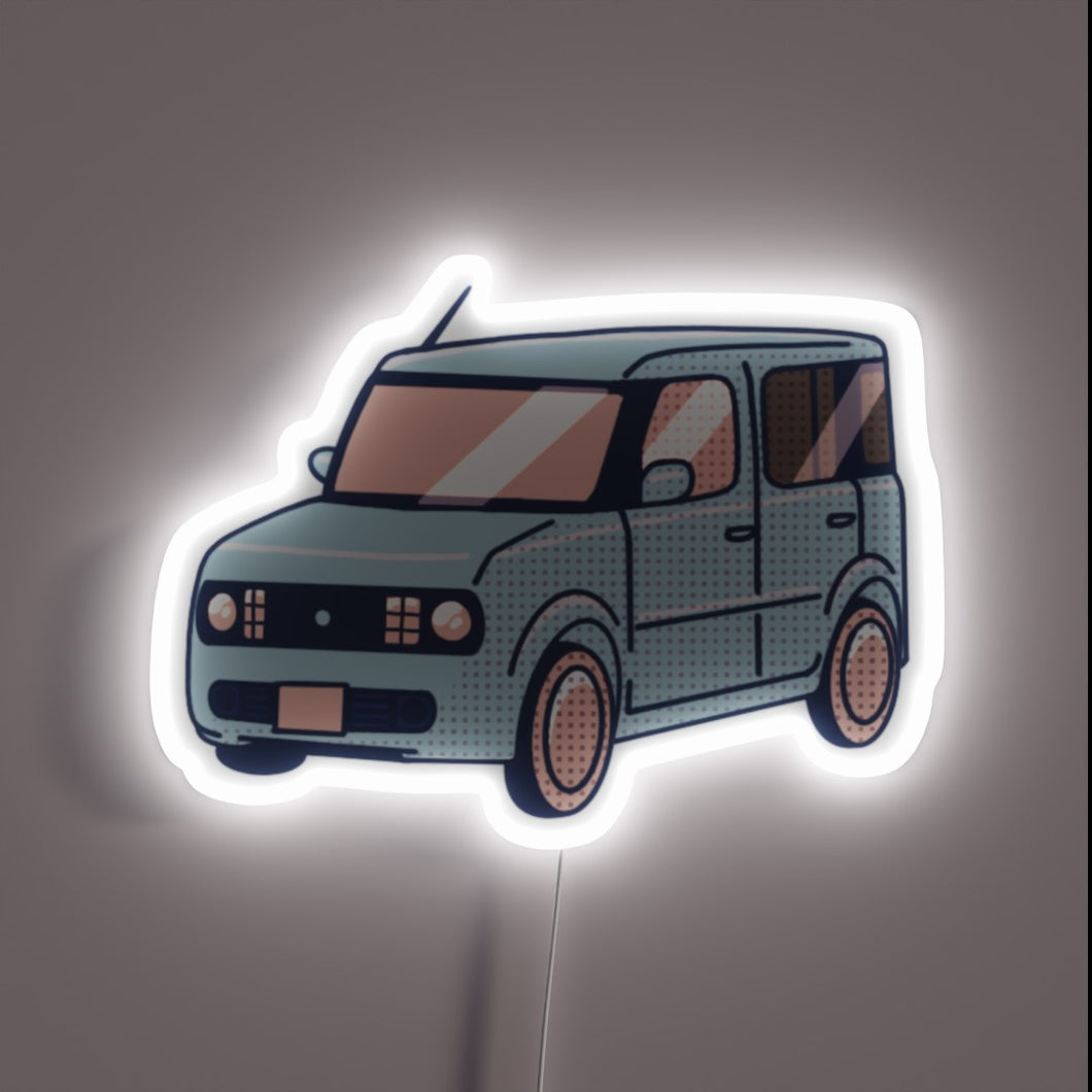 Vibrant neon sign illuminating the unique Nissan Cube interior style.