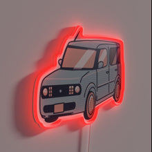 Charger l&#39;image dans la galerie, Neon Nissan Cube logo wall decoration with vibrant RGB lighting.