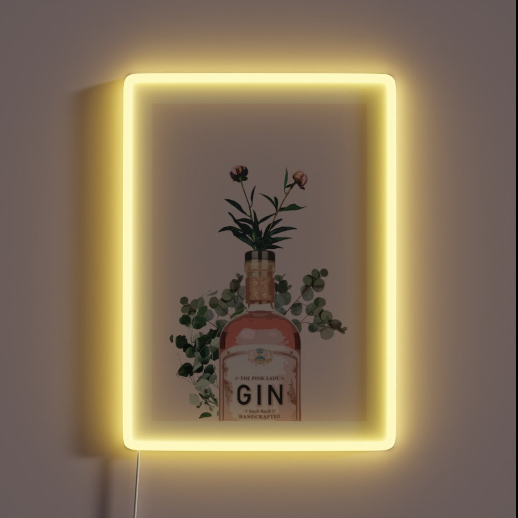 Vibrant pink neon sign illuminates space with gin-inspired artwork style
