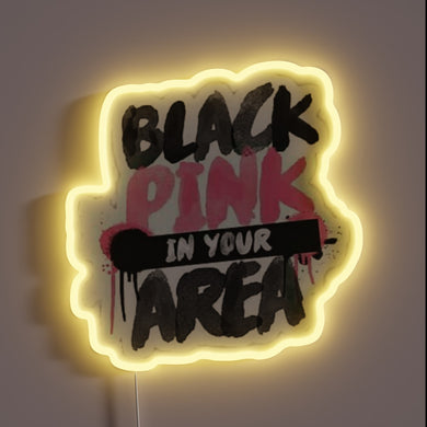 Neon sign with graffiti-style text: 