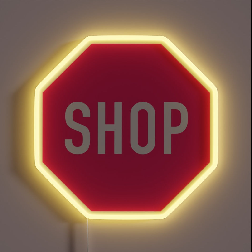 Vibrant pink neon sign reading 'shop' in modern RGB style.