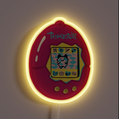 This glowing pink Tamagotchi neon sign brings nostalgic 90s vibes back to life—pixel pet and all!