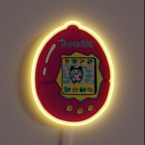 This glowing pink Tamagotchi neon sign brings nostalgic 90s vibes back to life—pixel pet and all!