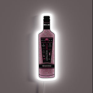 Neon sign shaped like a Pink Whitney glitter edition vodka bottle with a white glow.
